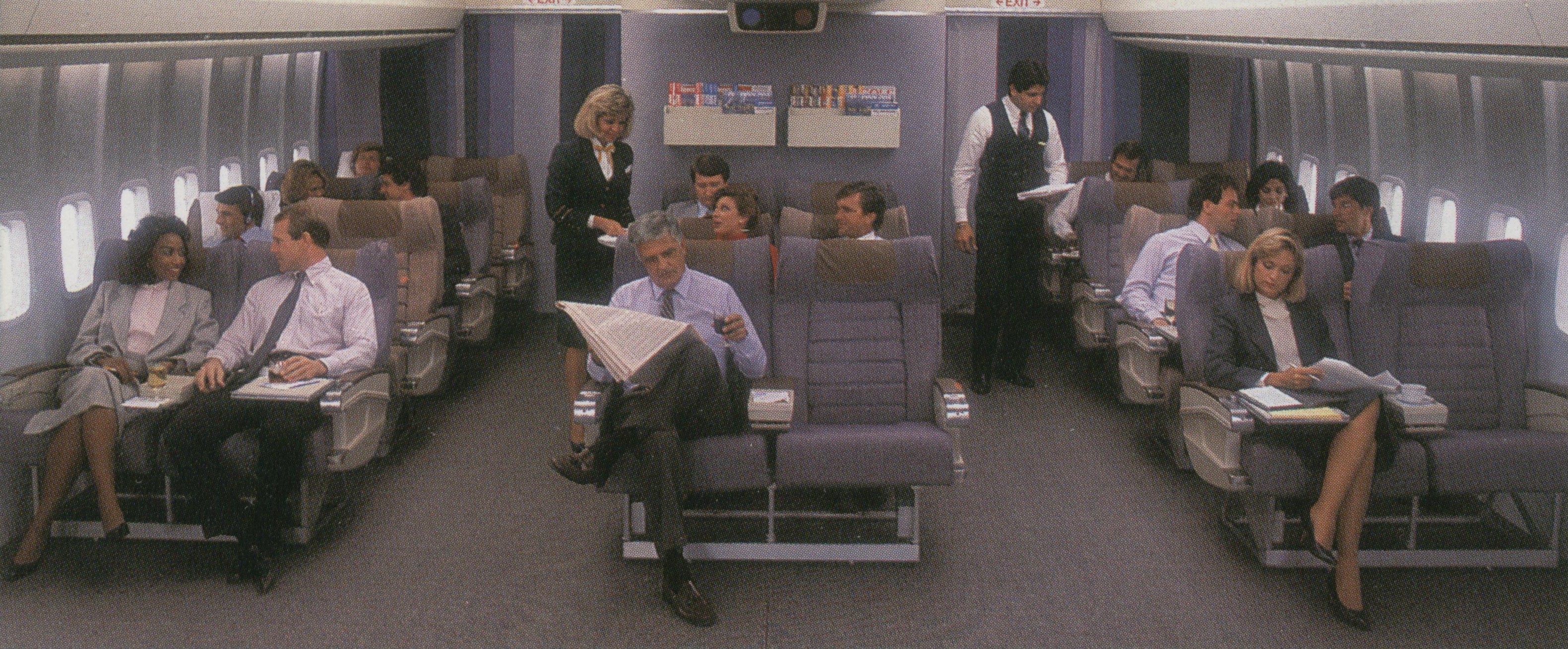 In the late 1980s Pan Am introduced a herringbone pattern for seat covers in Clipper Class (Business Class).  The coverings came in two colors blue and beige.  Both colors can be seen in this photo.